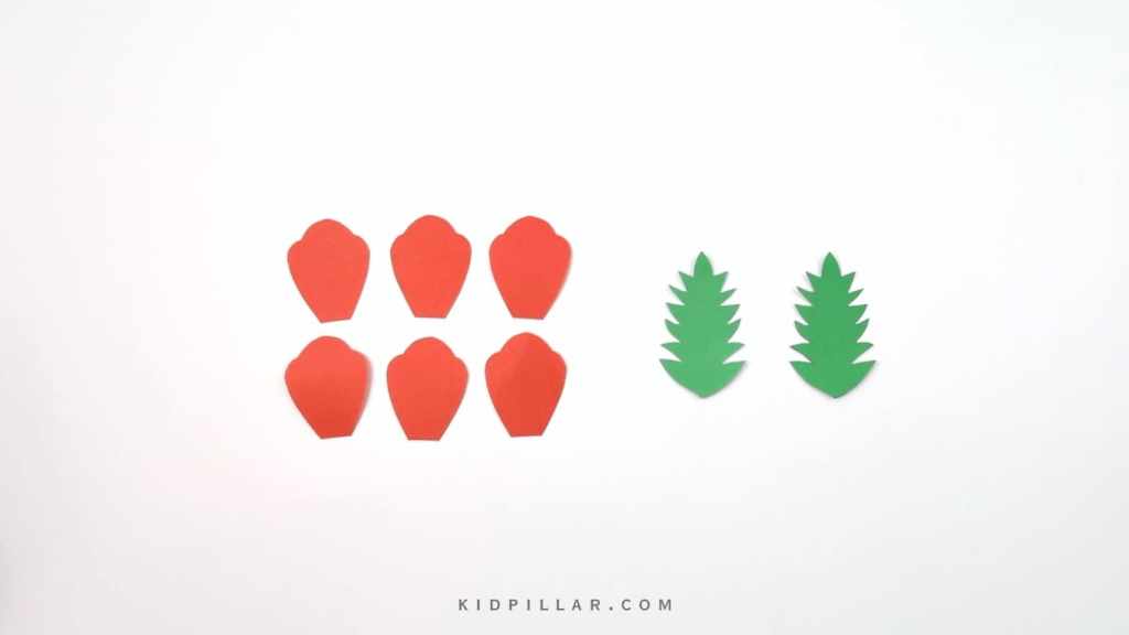 Cut petals and leaf from craft paper to make simple paper poppy flower craft kids