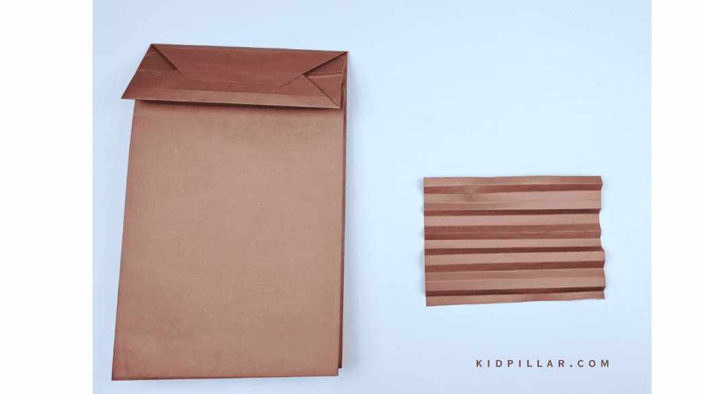 Make accordion fold to make owl craft’s wings