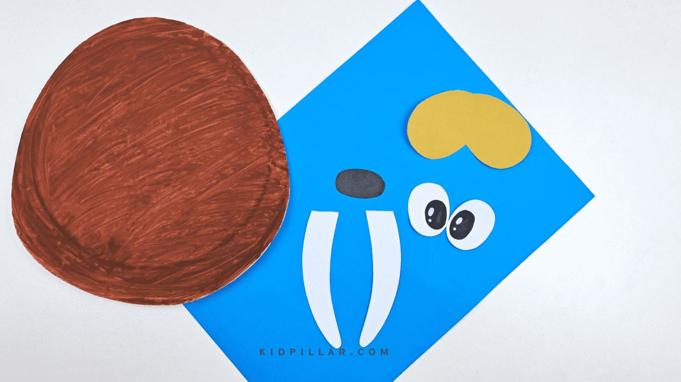 Make facial features of easy walrus paper plate craft